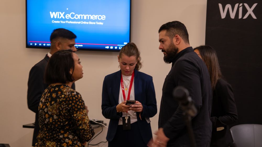 Jayden with attendees at the Wix eCommerce event